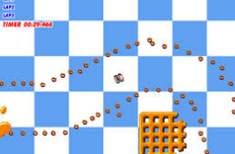 Скриншот из игры «Micro Machines»